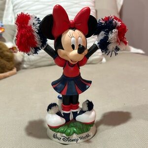 Minnie Mouse cheerleader, bobbles at the waist, like new,  never played with